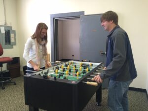 The Butchers play on the foosball table in the Clarkesville UMC's youth building called The Connection.