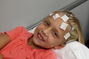 Ava's now 8 and though her convulsions are under control she's still experiencing brain seizures.