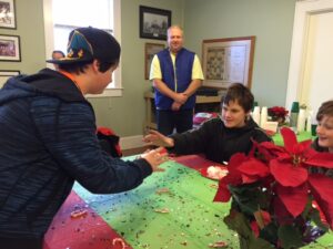 Boy Scouts entertained the children with magic tricks.