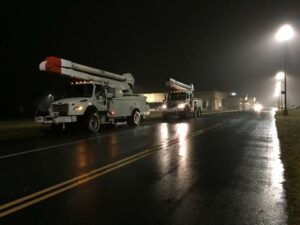 Bucket trucks from Georgia Power lined up near Walmart in Cornelia waiting to repair the damage caused by the wreck. Roads were impassable due to downed power lines.