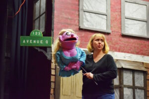 Alison Singer rehearsing with her puppet, Lucy, during one of the final dress rehearsals at HCT. The show opens Jan. 20.