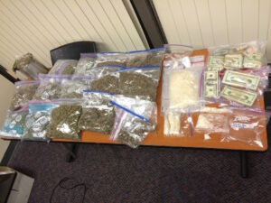 Drug agents seized $120,000 worth of  marijuana and meth and over $16,000 in cash.  