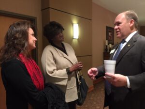 Dist. 28 Rep. Dan Gasaway talks with constituents after the pre-legislative breakfast.