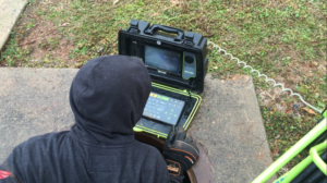 Clarkesville Public Works crew member Adam Westmoreland tried to coax the puppy out of the pipe using a sewer camera. It didn't work but rescuers were able to monitor the dog's whereabouts with the camera.