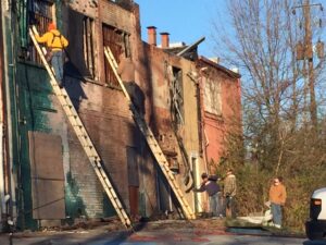 Asbestos has to be removed from inside the historic buildings that were damaged by fire.