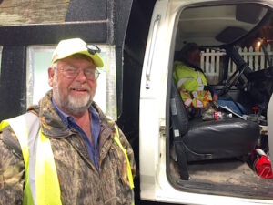 Habersham County road crews like Terry Carver (left) and Bennie Anderson worked through the night Monday scraping and salting the roads.