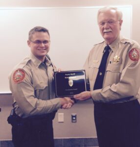 White County Deputy Richard Tabbott receives the 2015 ADTF Interdiction Award from Sheriff Neal Walden.