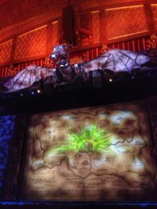 The opening curtain of Wicked appears in front of hundreds of audience members before the show begins and during intermission. The Fox Theatre has hosted the show multiple times.