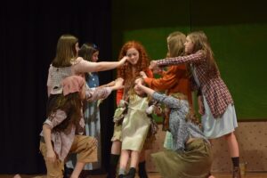 Cast members of Annie at North Habersham Middle School rehearse for the Spring musical which will be presented this Friday and Saturday at 7:30PM in the school's gymnasium.