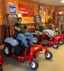 Vic and Keith show off their "ready to own" supply of yard equipment at their new Clarkesville Location.