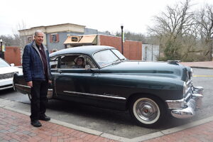 Jay and Elaine Friedman of Marietta and their 1949 Cadillac sedan. The car was among those featured in the 1989 film Driving Miss Daisy.