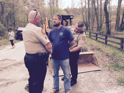 White County Sheriff's Deputies take Shannon Hamilton into custody on Gene Nix Road