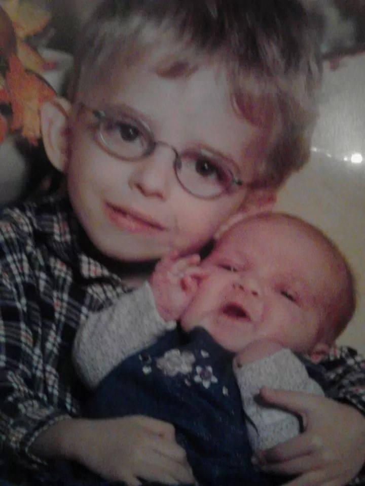 Conner with his baby sister.