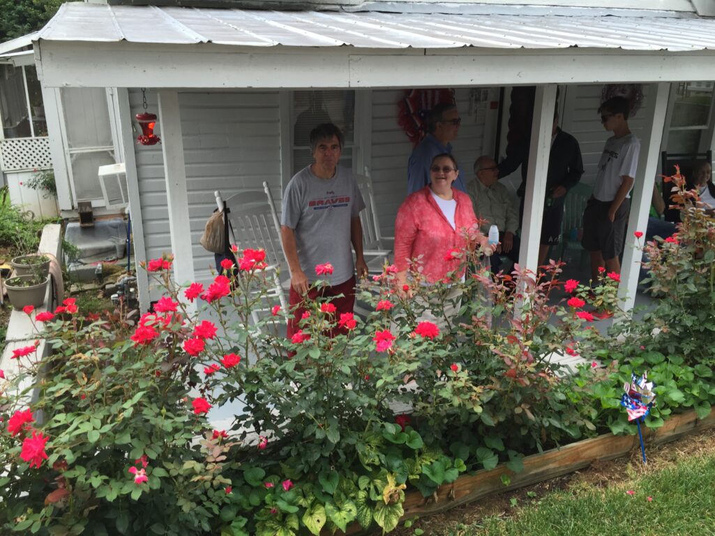  For forty years the Heaton family has had roadside seats for the Demorest Fourth of July parade. Pictured are Keith and Jennie Heaton Hallford, talking with parade-watchers.