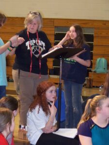 North Habersham Middle School music teacher Paula Gibson directs students during rehearsals for the 2016 production of "The Lion King."