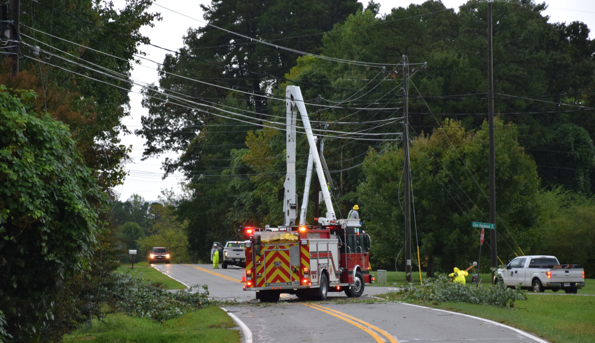 Emergency services clear roads and restore power after storm