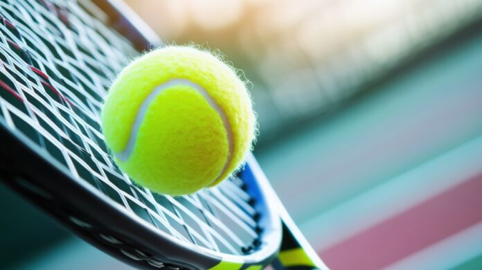 tennis ball hitting the net strings