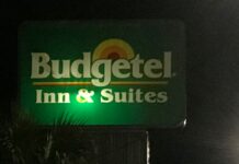 One dead after shooting at the Budgetel Inn & Suites