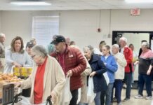 Old cafeteria finds new purpose as volunteers pack meals for Habersham County students